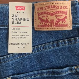 Levi’s 312 slim shaping jeans